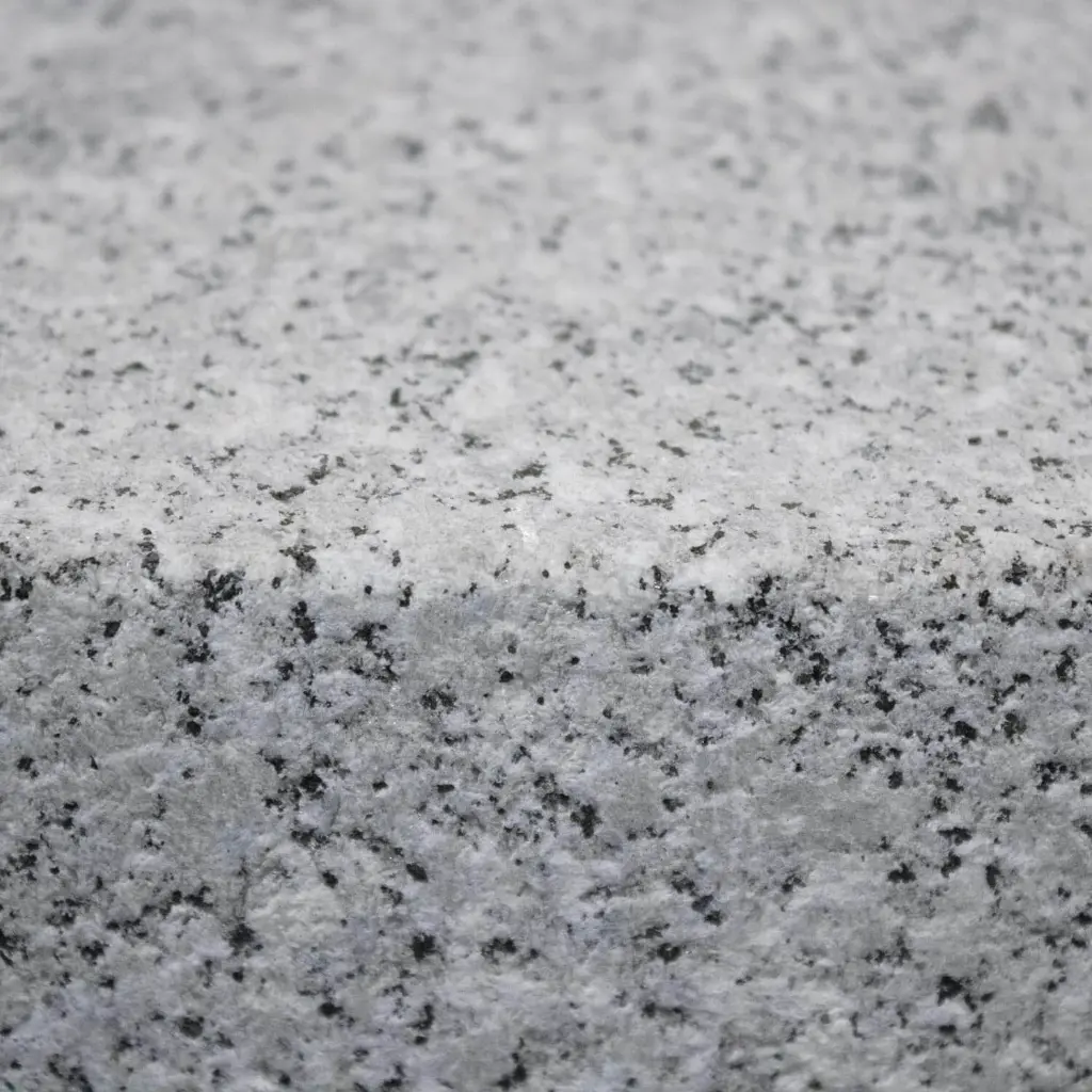 GRA01-Rasenkante-Granit-100x25x8-Textur.webp